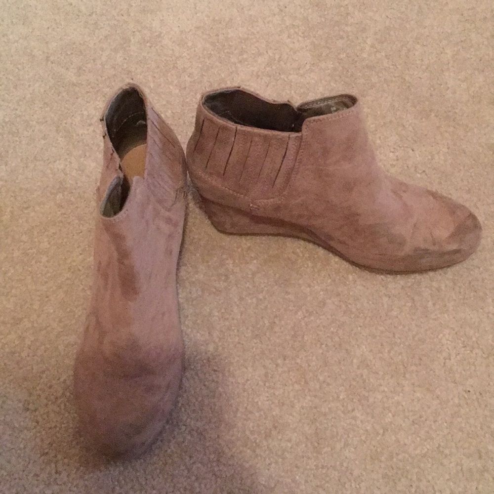Heeled brown boots with textile around back ankle